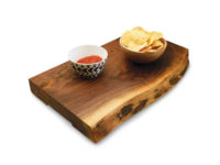 Chips and salsa dip on a slab-top serving block