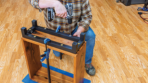 Attaching base to bookcase carcass