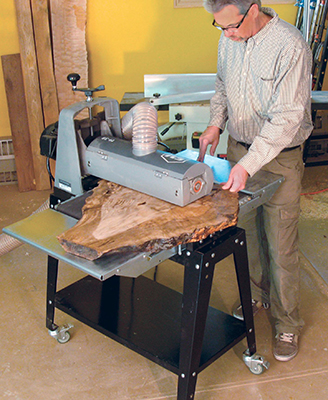 Surfacing a wide, irregular piece of wood is made easier with a horizontal drum sander like this one. Other good surfacing options would include handheld belt sanders and hand planes.