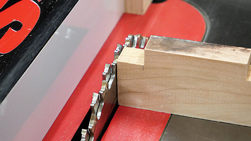 Setting height on dado blade for cutting notches in shelf support
