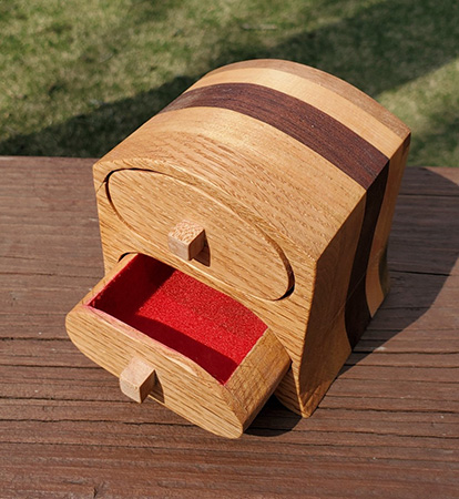 Small jewelry box with red liner