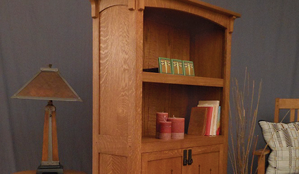 Bookcase featuring spade inlays