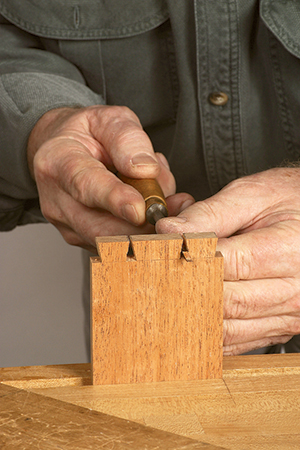 Finishing dovetail joint clean-up with file