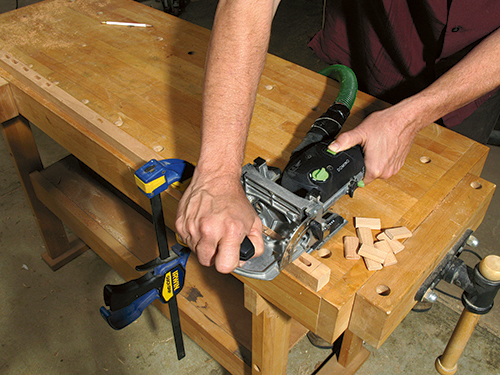 Cutting dominoes in desk leg