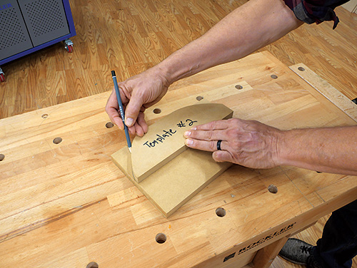 Marking contoured shape of coat hook on template