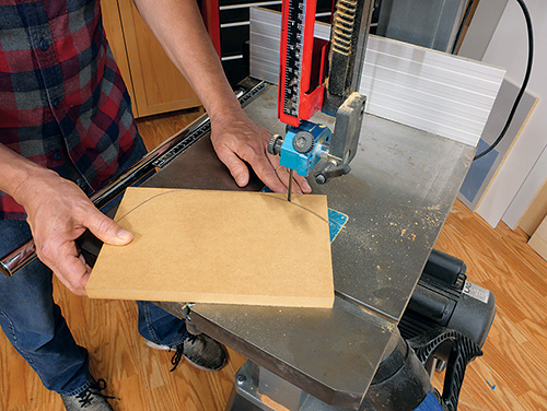 Cutting out coat hook blanks with a band saw
