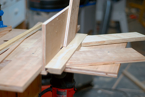Each leg side is routed once on the edge and once on the face. When routing the edge, the show side faces away from the table.