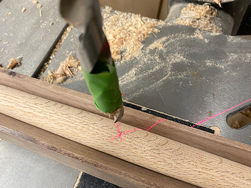 Using drill press to cut out stretcher hole