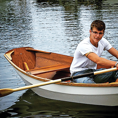 Testing mahogany rowboat