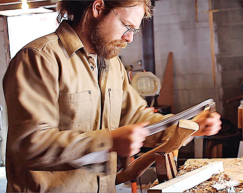 John Enger shaping wood in his workshop