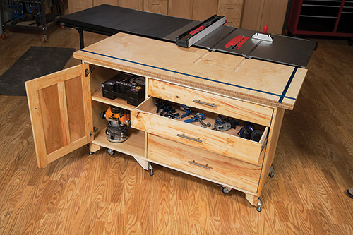 Outfeed table with drawers and cabinet