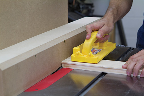 Trimming tenons for installing cutfeed table door rail