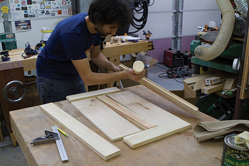 Assembling frame-and-panel door for outfeed table cabinet