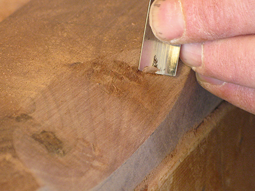 Adding texture to wood with a curved gouge