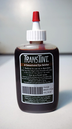 A bottle of TransTint orange dye