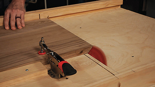 Miter cutting panels with the assistance of a crosscut sled