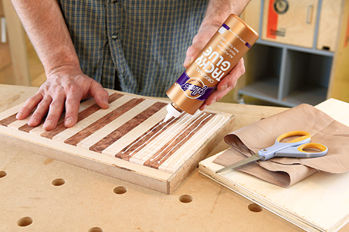 Adding lines of glue to tambour gift box door slats