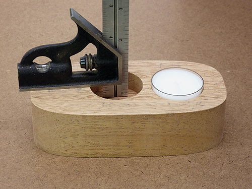 Measuring depth of tea light holder hole