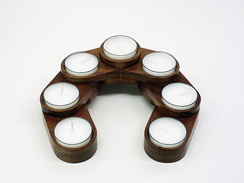 Curved tea light holders