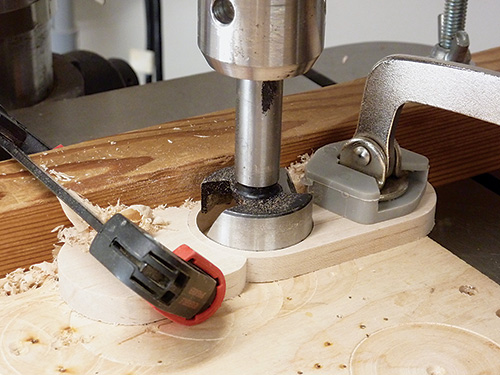 Clamping menorah blank on drill press table