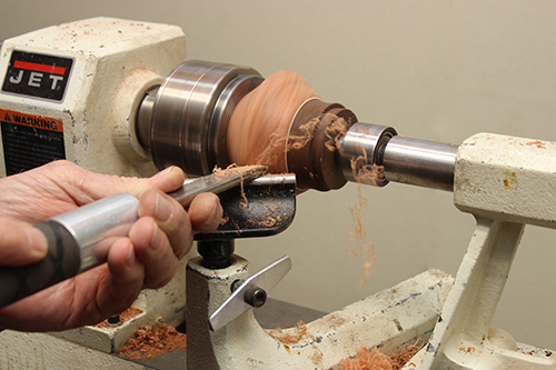 Turning candleholder with gouge