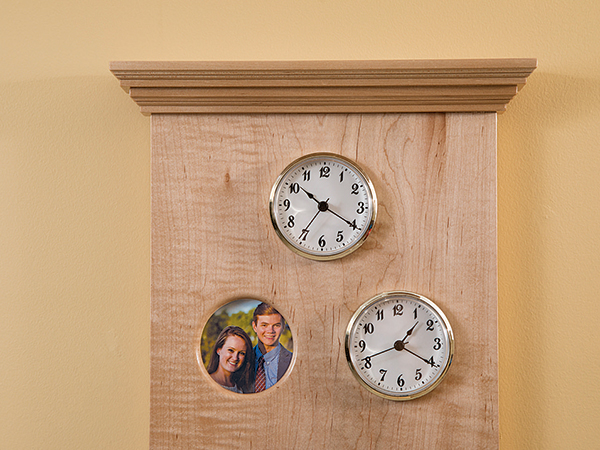 Frame with two clocks and a picture frame