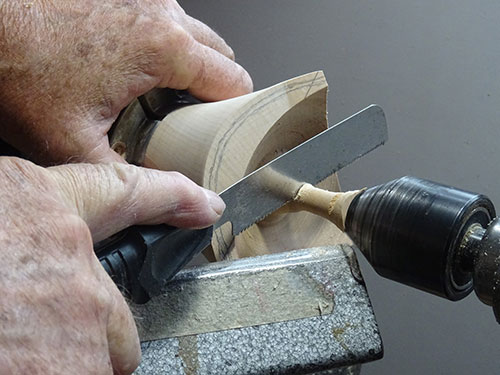 Trimming spindle off top of box blank