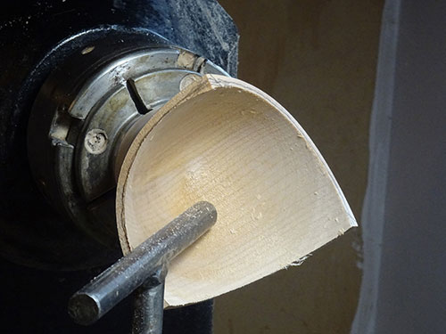 Hollowed out bowl blank on lathe