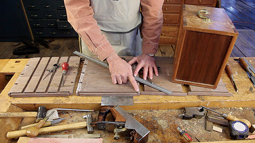 Tool chest back panel groove