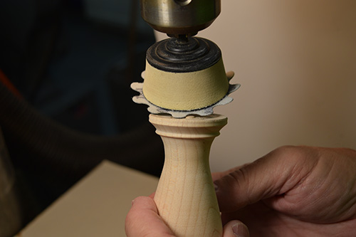 Sanding off bottom of toothpick holder