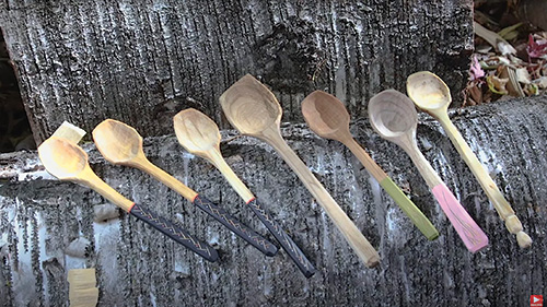 Display of different types of carved spoons