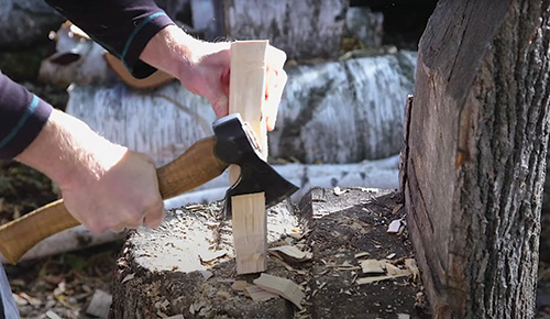 Cutting rough spoon shape with axe