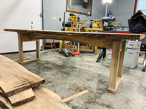 Leve edge stretcher on trestle table