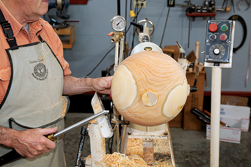 Bottom of partially turned calabash bowl