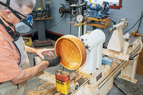 Rubbing Waterlox finish on bowl interior