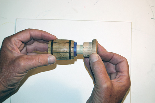 Setting cork into stopper