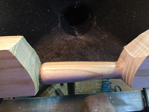 Turned and sanded bread knife handle