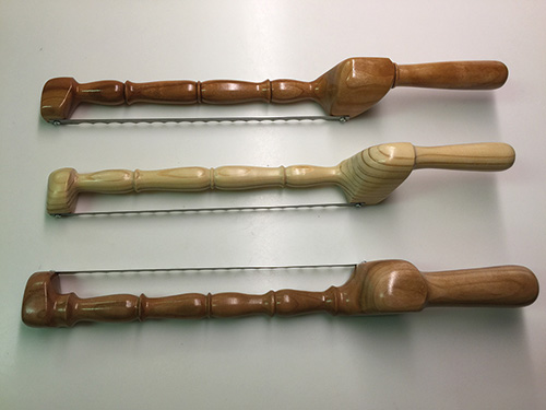 Selection of different styles of turned bread knives