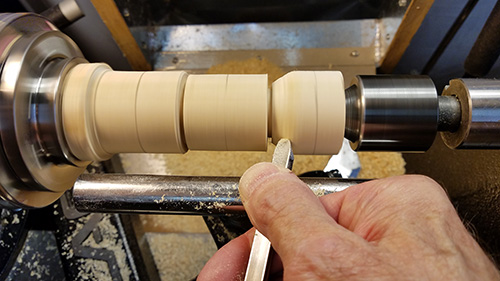 Making initial ornament end cuts with spindle gouge