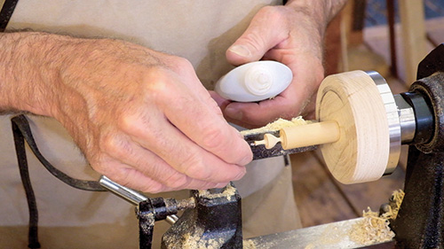 Applying super glue to earring woodturning project