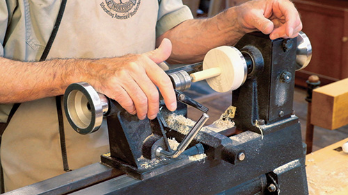 Mounting wood for turned earring on the lathe