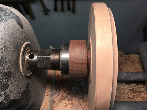 Side-view of hourglass blank ready to be removed from glueblock