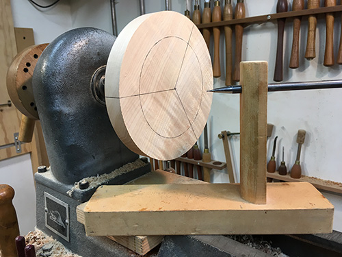 Marking spindle hole locations on hourglass blank