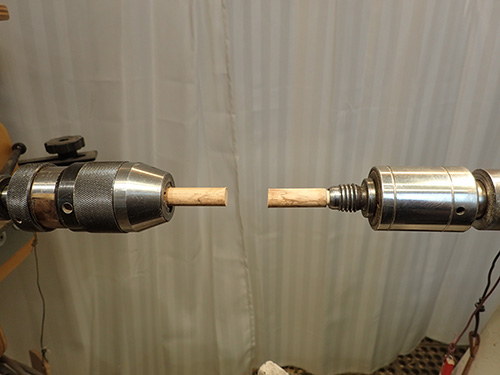 Dowel centers in lathe to hold lamp shaft blank