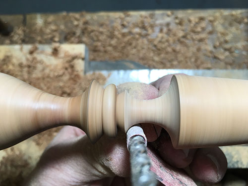 Sanding with paper wrapped around a drill bit