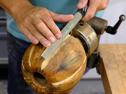 Deepening grooves in pumpkin turning with rasp