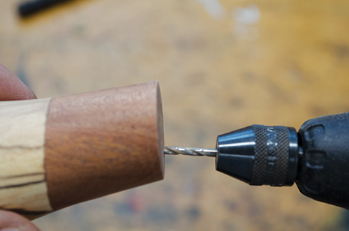 Drilling angled holes in off-center salt shaker