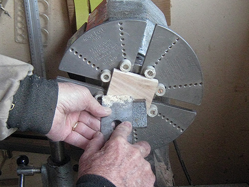 Flattening base of square box lid