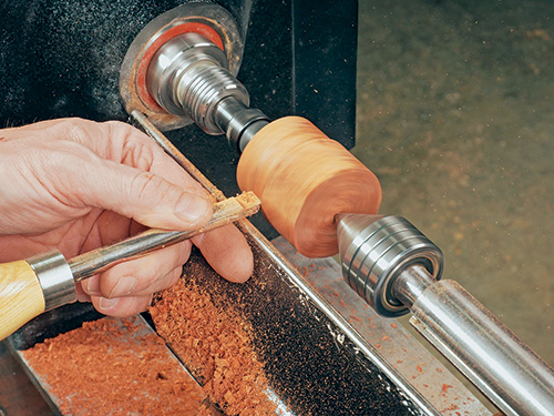 Starting bottle stopper turning with spindle-roughing gouge