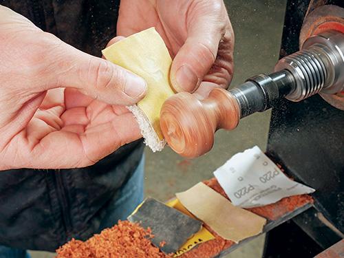 Sanding down bottle stopper handle